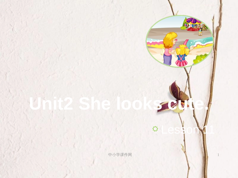 五年级英语上册 Unit 2 She looks cute（Lesson 11）教学课件 人教精通版_第1页